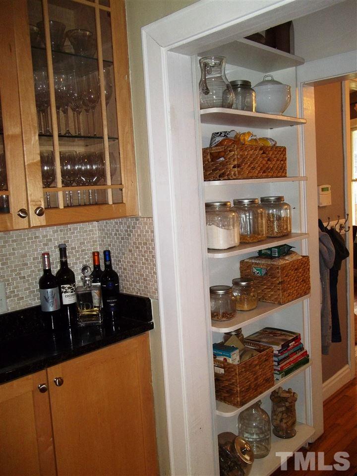 507 Cleveland Street Raleigh, NC 27605 - Photo 16 of 25 a kitchen with a sink and a refrigerator