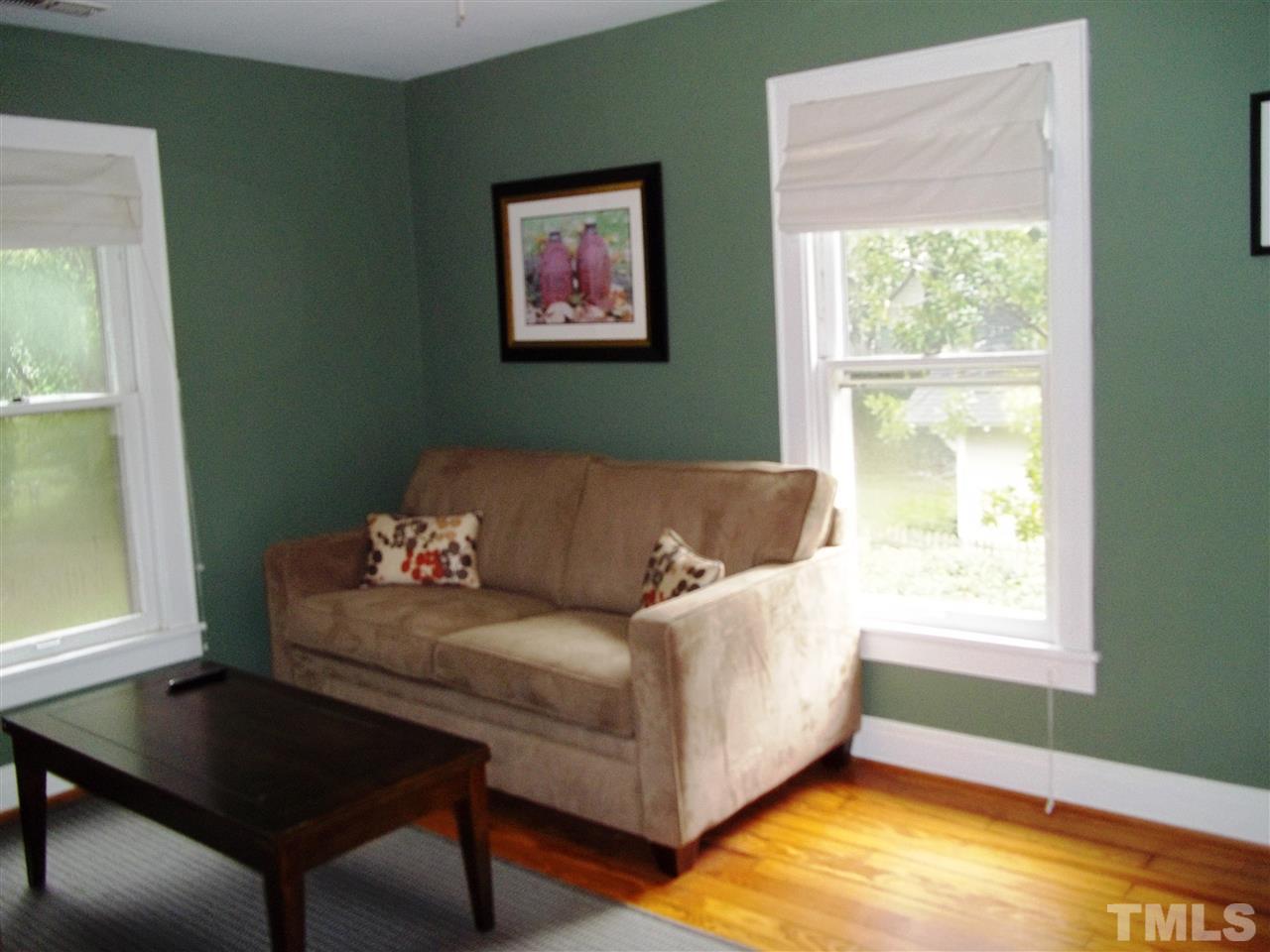 507 Cleveland Street Raleigh, NC 27605 - Photo 18 of 25 a living room with furniture and a window