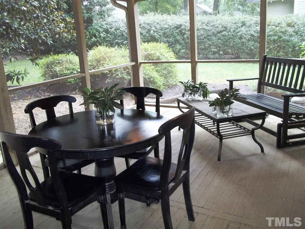 507 Cleveland Street Raleigh, NC 27605 - Photo 23 of 25 a view of a dining room with furniture and window
