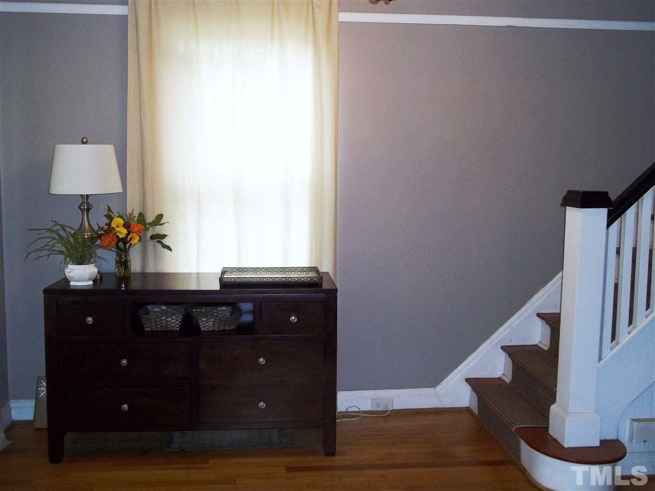 507 Cleveland Street Raleigh, NC 27605 - Photo 6 of 25 a living room with furniture and a window