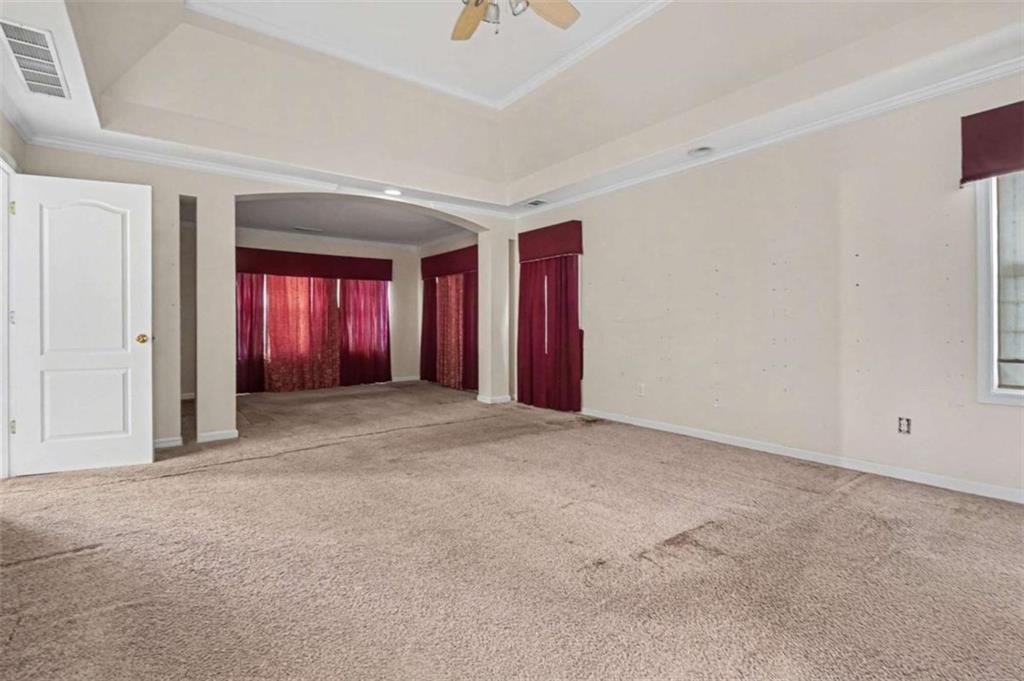 3183 Gus Robinson Road Powder Springs, GA 30127 - Photo 12 of 27 an empty room with windows and closet