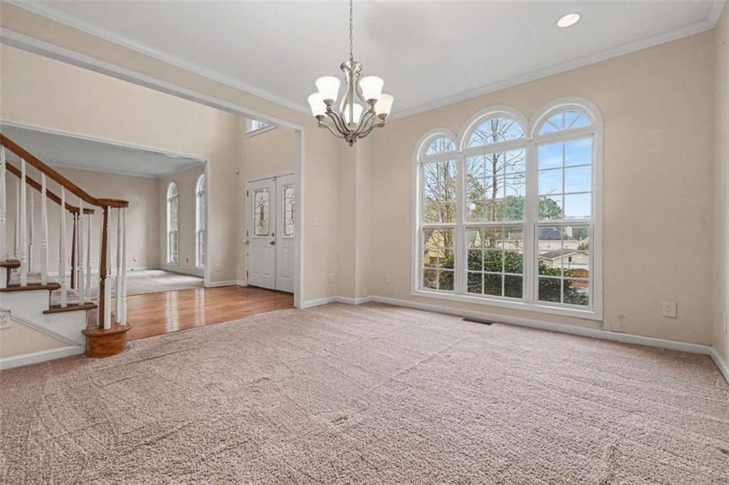 3183 Gus Robinson Road Powder Springs, GA 30127 - Photo 3 of 27 a view of an empty room with a window