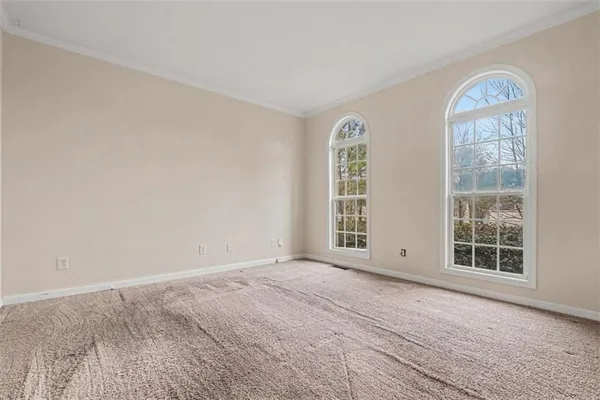 an empty room with windows