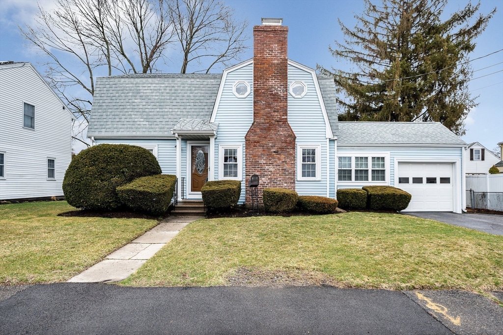 a view of a couches in the patio and a yard
