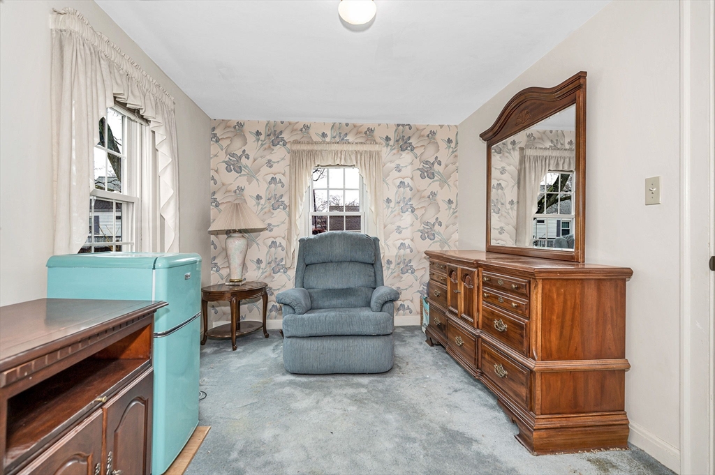 9 Allen Road Waltham, MA 02453 - Photo 19 of 40 a living room with furniture and a window