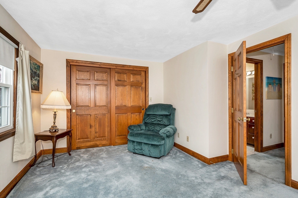 9 Allen Road Waltham, MA 02453 - Photo 25 of 40 a living room with furniture and a window