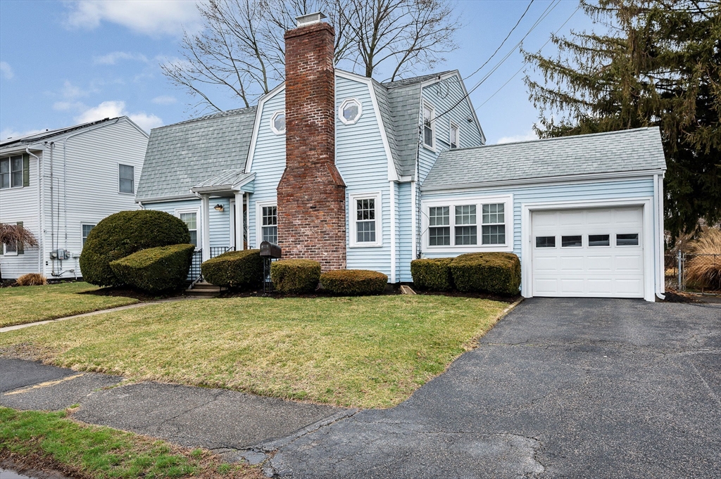 9 Allen Road Waltham, MA 02453 - Photo 31 of 40 a view of a house with backyard and sitting area
