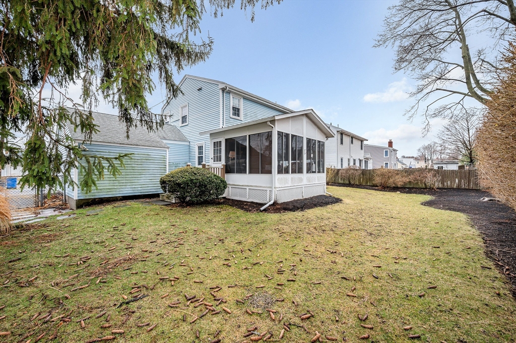 9 Allen Road Waltham, MA 02453 - Photo 32 of 40 a white house that has a tree in front of it