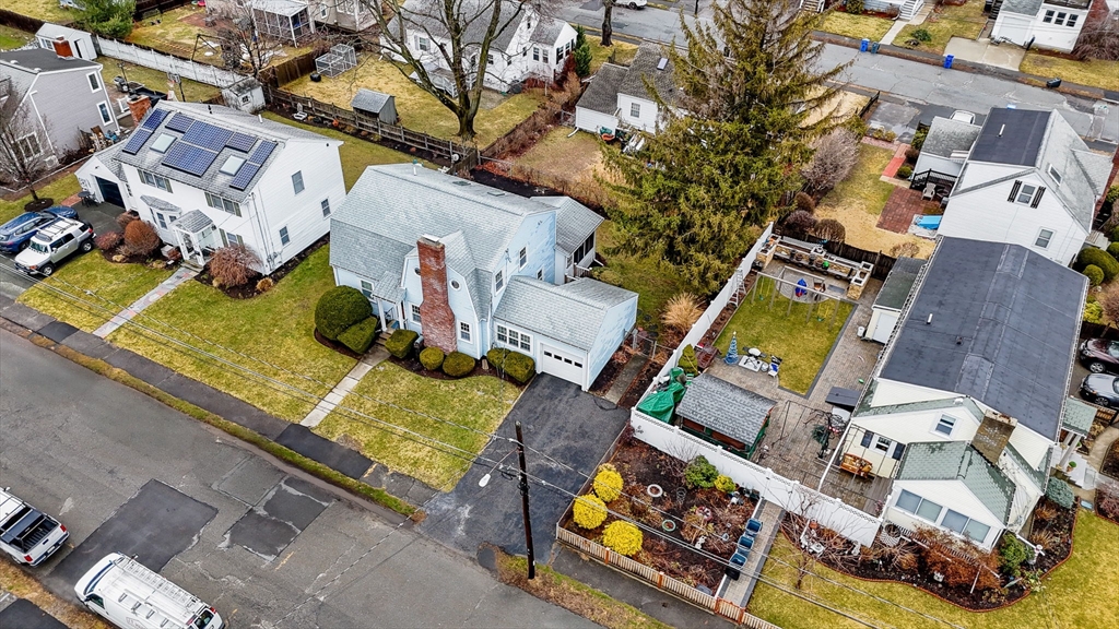 9 Allen Road Waltham, MA 02453 - Photo 35 of 40 an aerial view of a swimming pool with outdoor seating