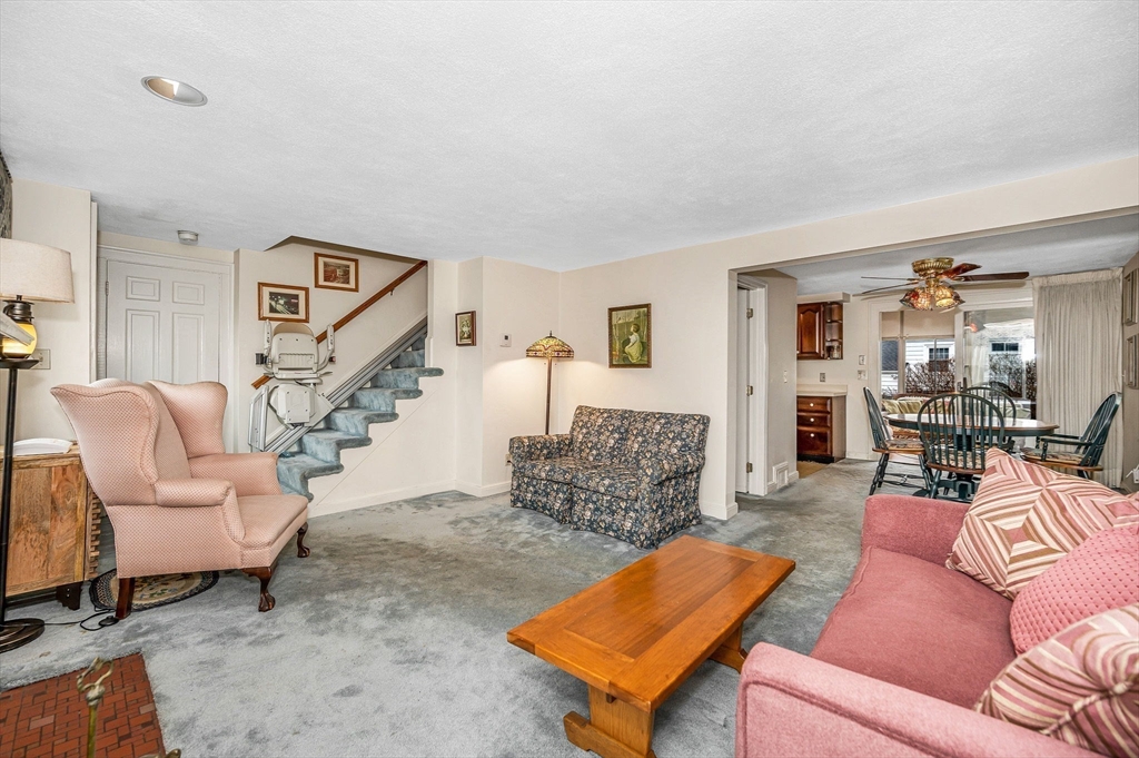 9 Allen Road Waltham, MA 02453 - Photo 4 of 40 a living room with furniture and a wooden floor