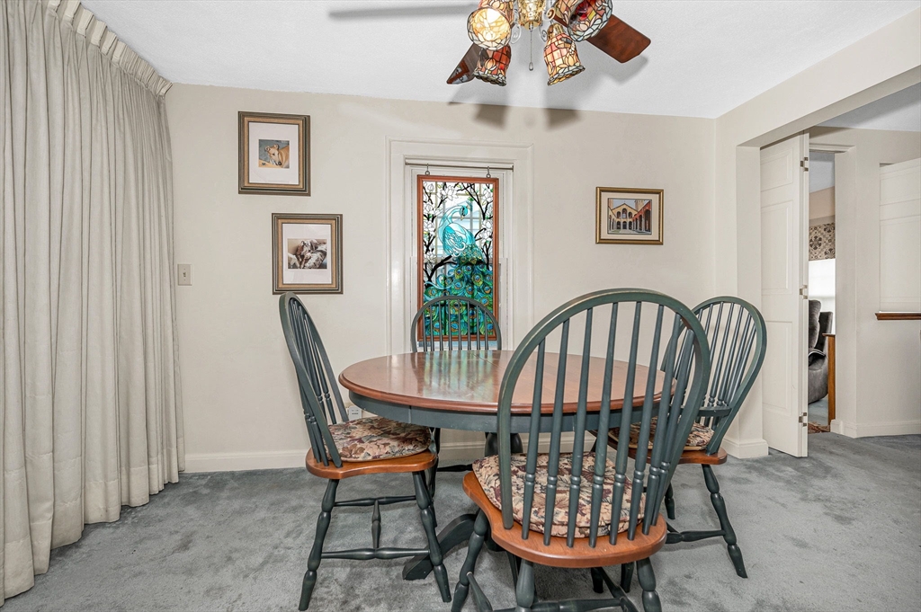 9 Allen Road Waltham, MA 02453 - Photo 10 of 40 a view of a room with furniture wooden floor and a chandelier