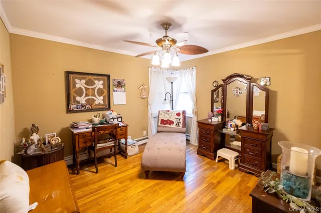 a living room with fireplace furniture and a chandelier