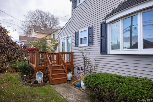 a view of a bench in the backyard