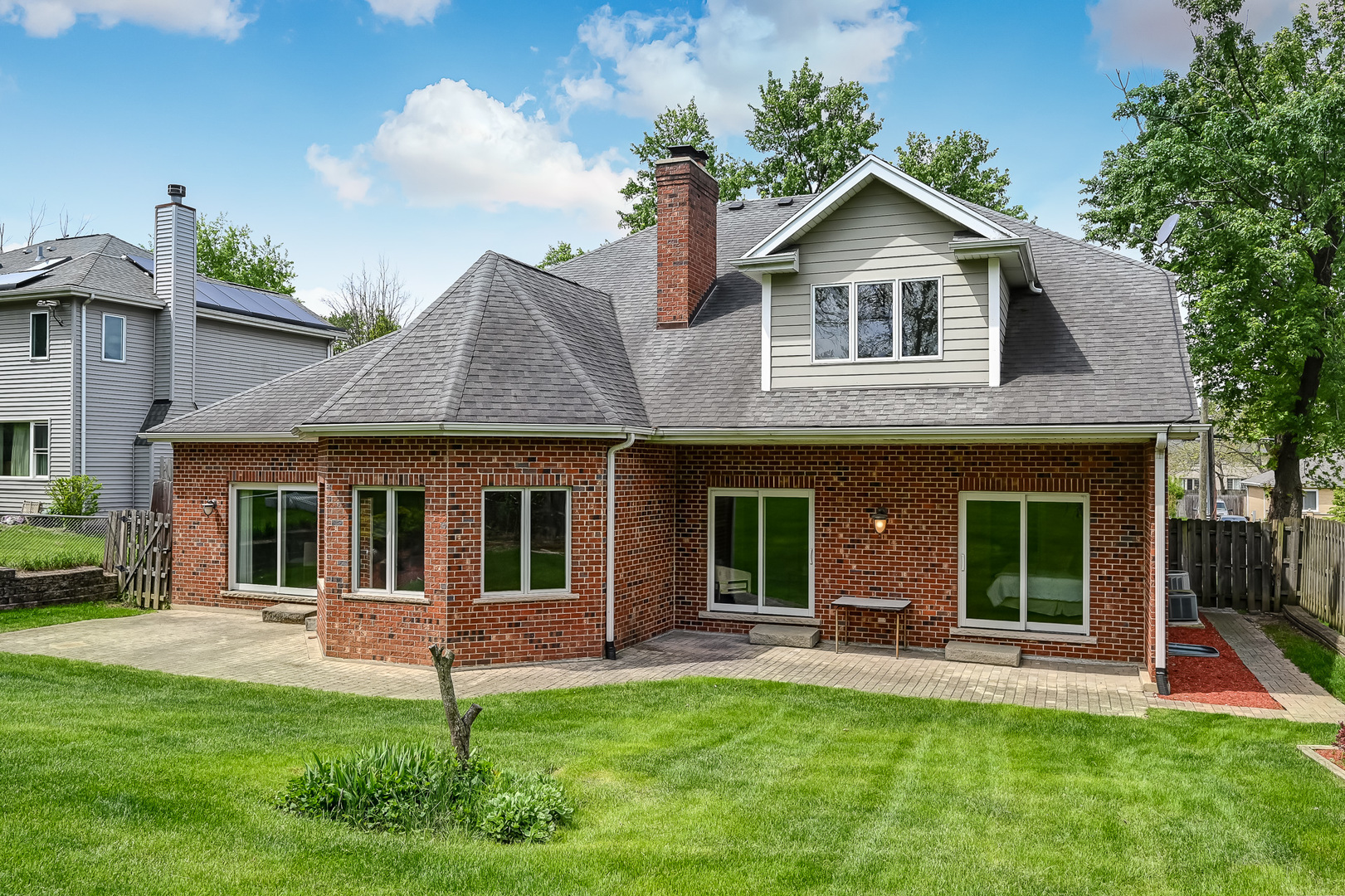 8827 Palisades Road Burr Ridge, IL 60527 - Photo 35 of 35 a front view of a house with a yard and porch