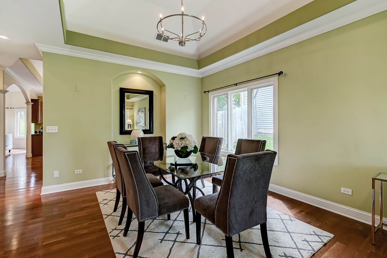 8827 Palisades Road Burr Ridge, IL 60527 - Photo 6 of 35 a view of a dining room with furniture window and wooden floor