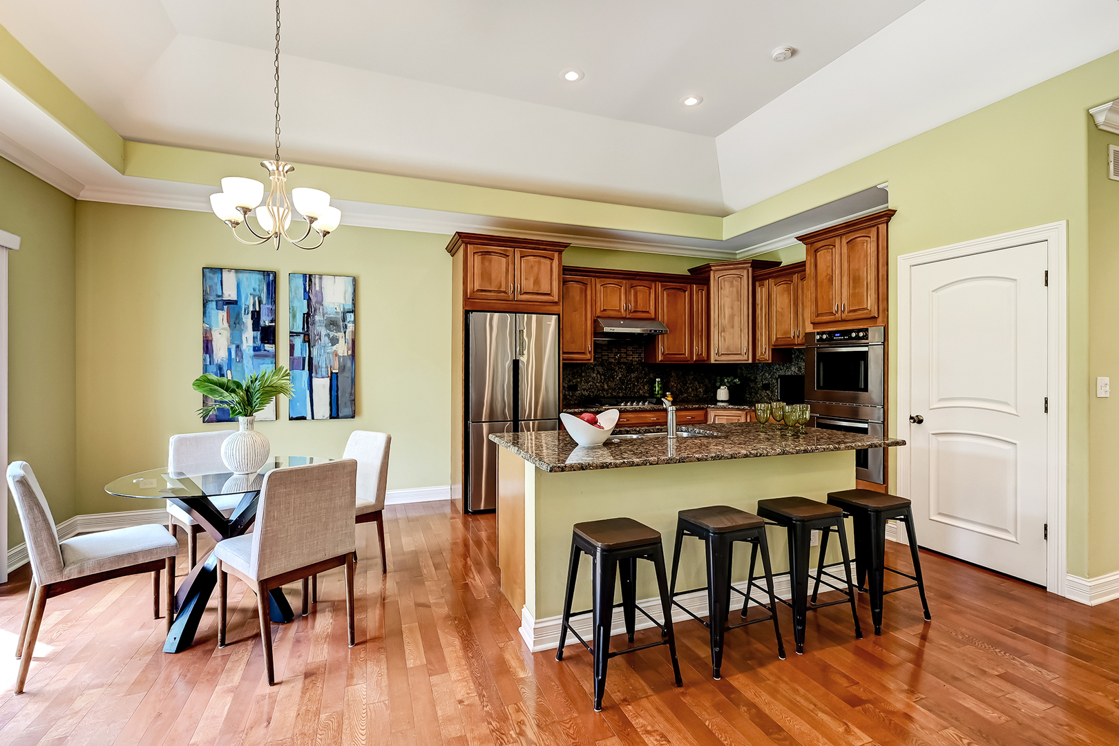 8827 Palisades Road Burr Ridge, IL 60527 - Photo 8 of 35 a view of a dining room with furniture window and wooden floor
