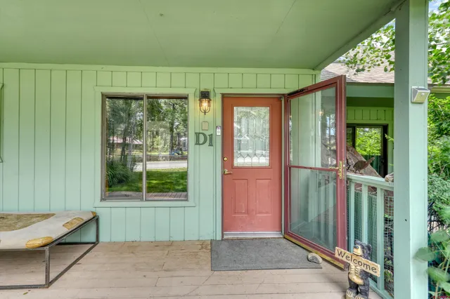 a backyard of a house with seating space