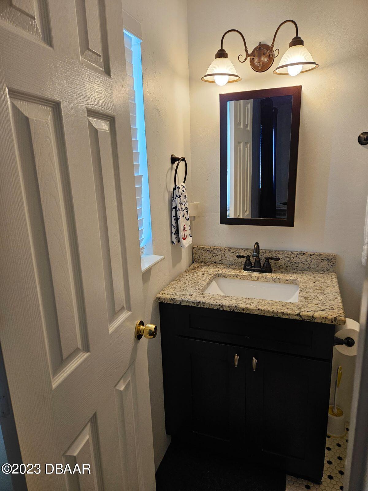301 Farmbrook Road Port Orange, FL 32127 - Photo 9 of 20 Master Bathroom 2