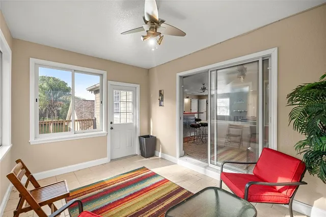 a view of balcony with wooden floor and fence