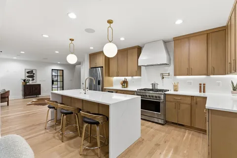 a view of a dining room with furniture and window