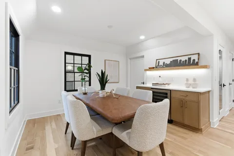 a close view of a utility room with washer and dryer