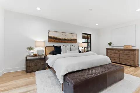 a room with a cabinets and a window