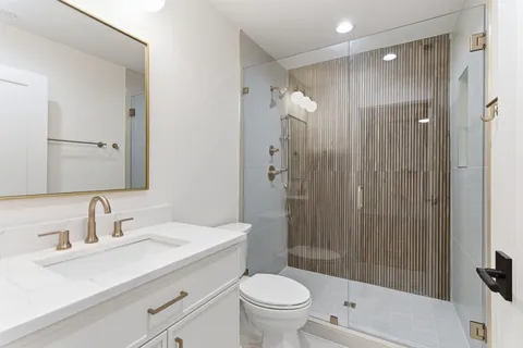 a view of a balcony with wooden floor