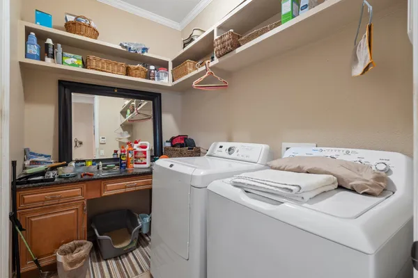 a view of livingroom with furniture and balcony