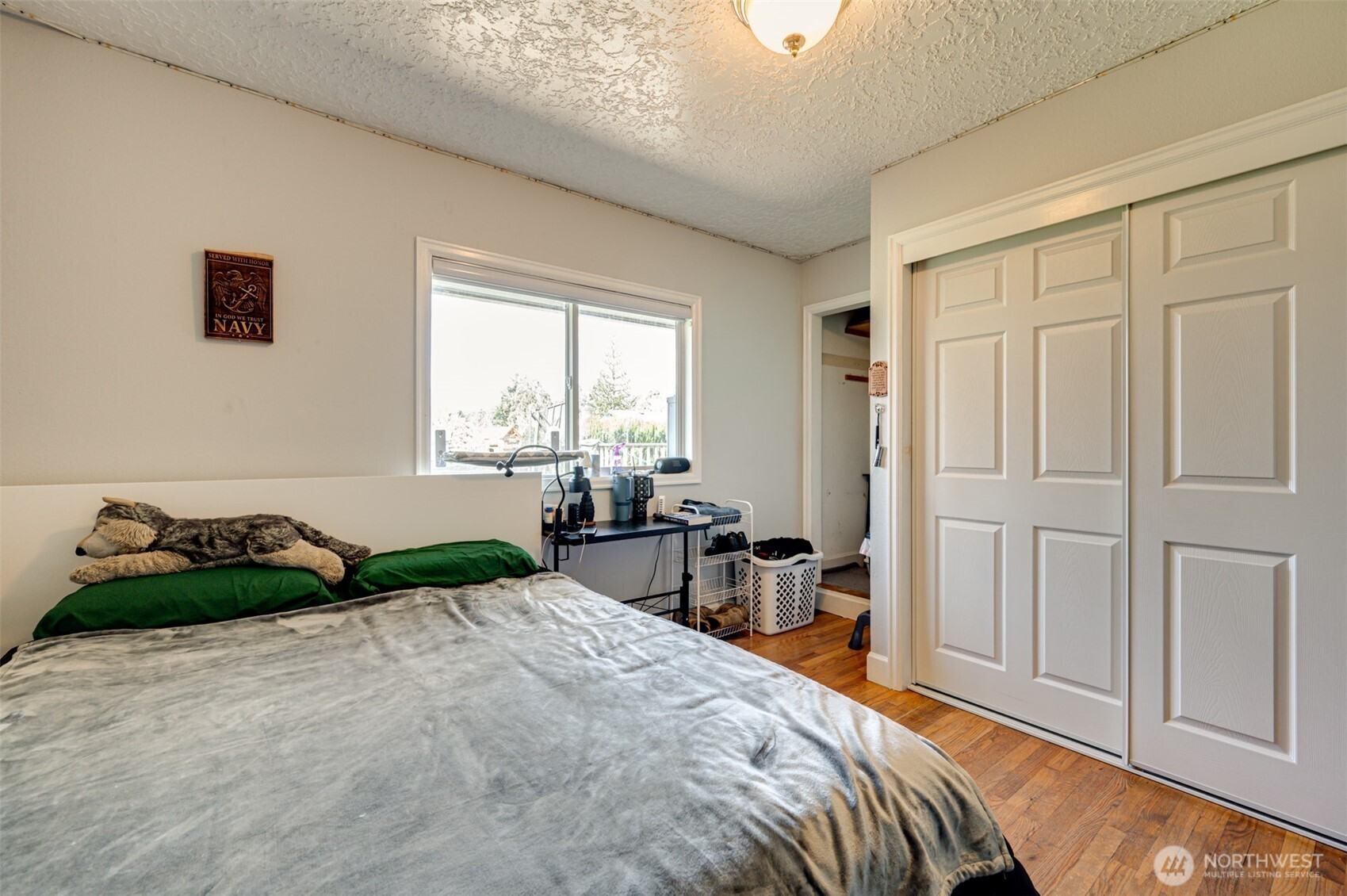 2126 Lewis River Road Woodland, WA 98674 - Photo 15 of 23 a bedroom with a bed and a window
