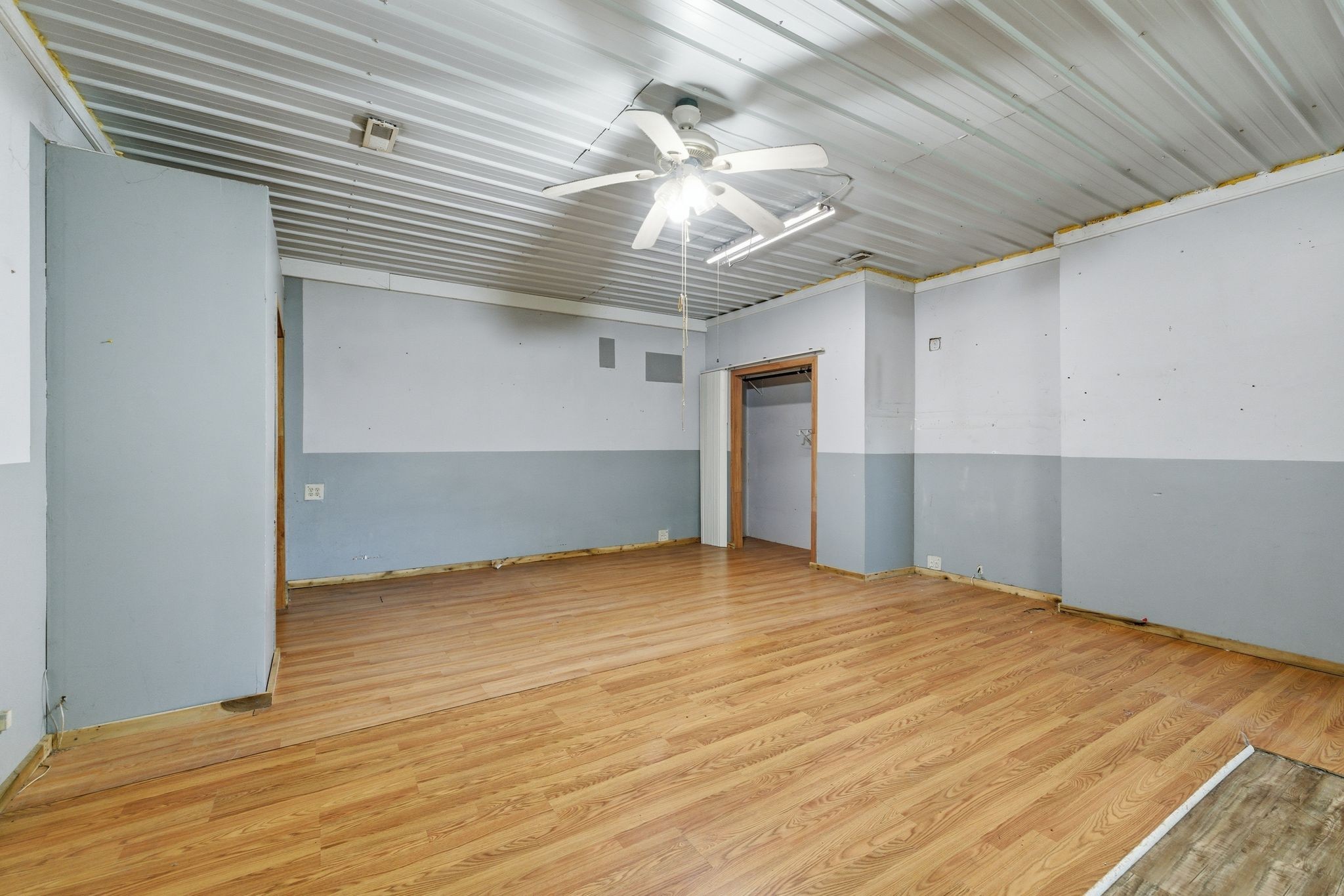 1021 B Jordan Road Lascassas, TN 37085 - Photo 37 of 58 a view of an empty room with a ceiling fan