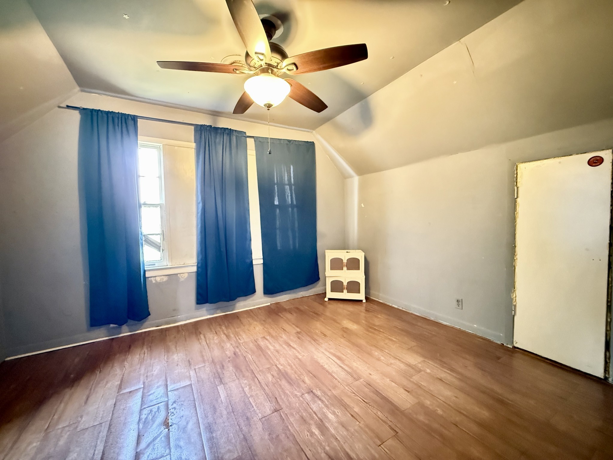 1408 Holly Grove Road Lewisburg, TN 37091 - Photo 17 of 19 a view of an empty room with wooden floor