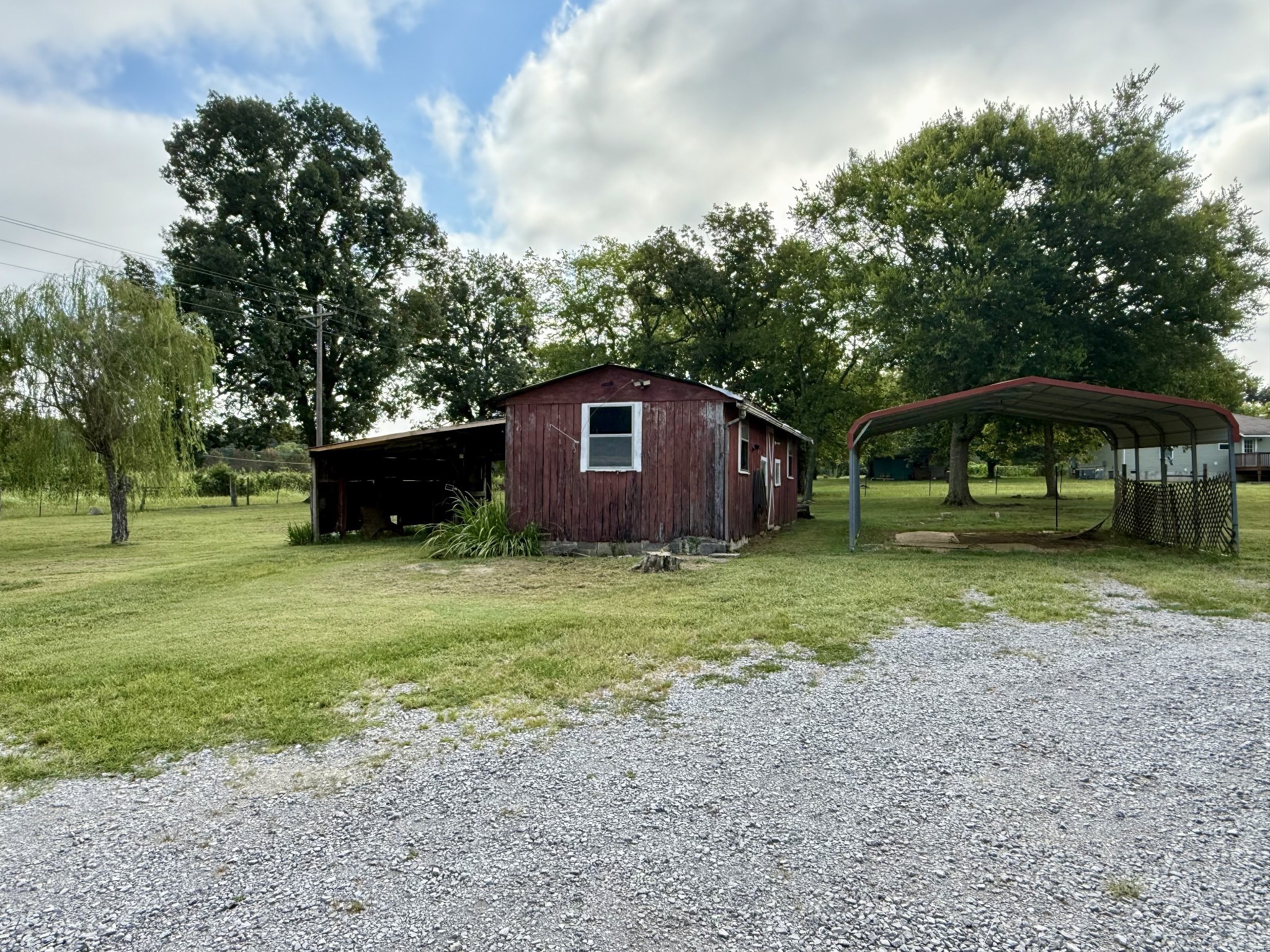 1408 Holly Grove Road Lewisburg, TN 37091 - Photo 4 of 19 a view of a house with backyard
