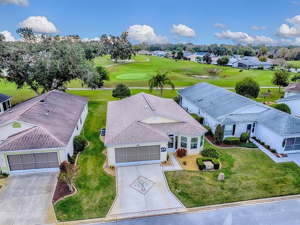 634 Timbercrest Drive Leesburg, FL 34748 - Photo 37 of 38 an aerial view of a house with yard swimming pool and outdoor seating