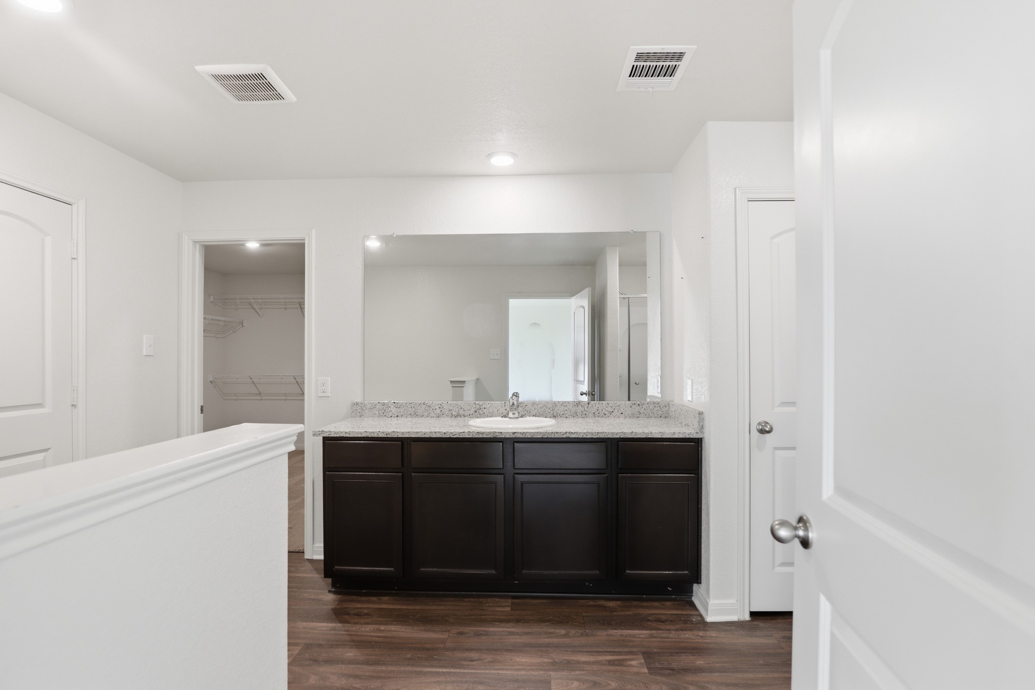 300 Hyacinth Way Jarrell, TX 76537 - Photo 19 of 30 a view of cabinets a sink and dishwasher in a room