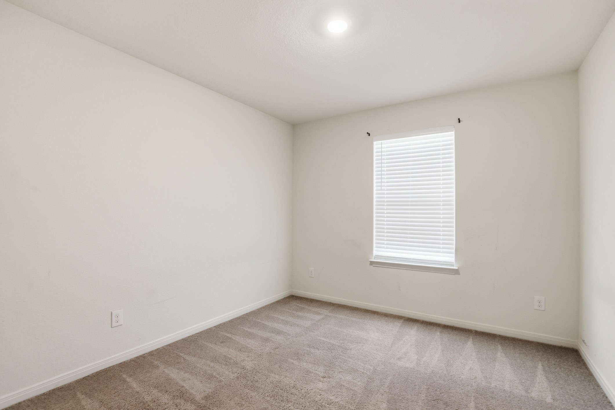 300 Hyacinth Way Jarrell, TX 76537 - Photo 25 of 30 an empty room with a window