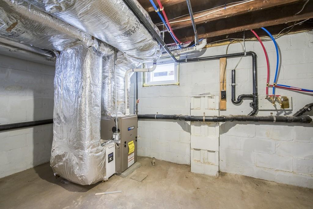 21 Old Point Street Springfield, MA 01109 - Photo 28 of 32 a view of storage and utility room