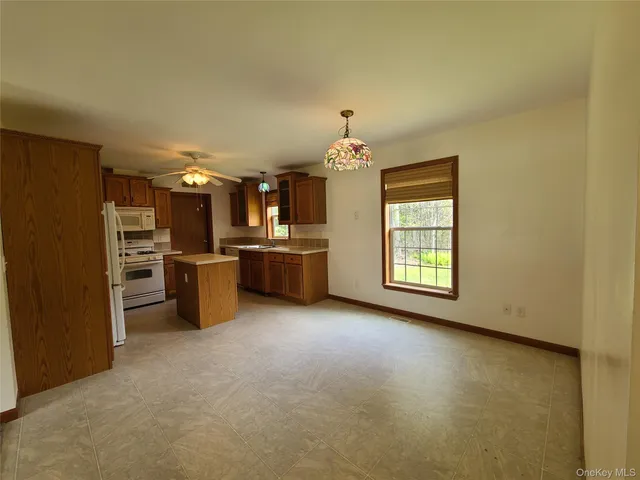 a view of a kitchen with a sink and dishwasher kitchen view