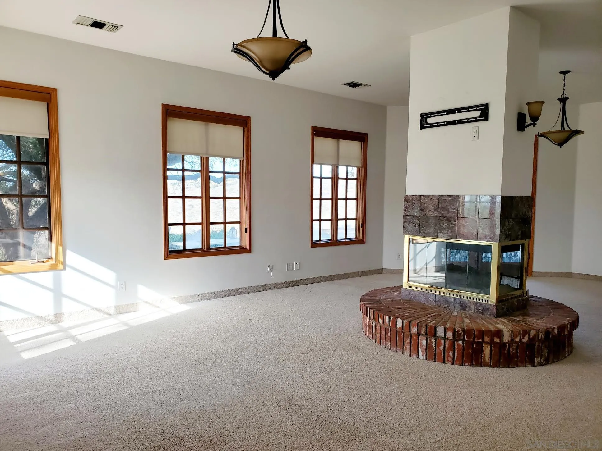 14316 Twisted Branch Road Poway, CA 92064 - Photo 11 of 36 a living room with furniture and a fireplace