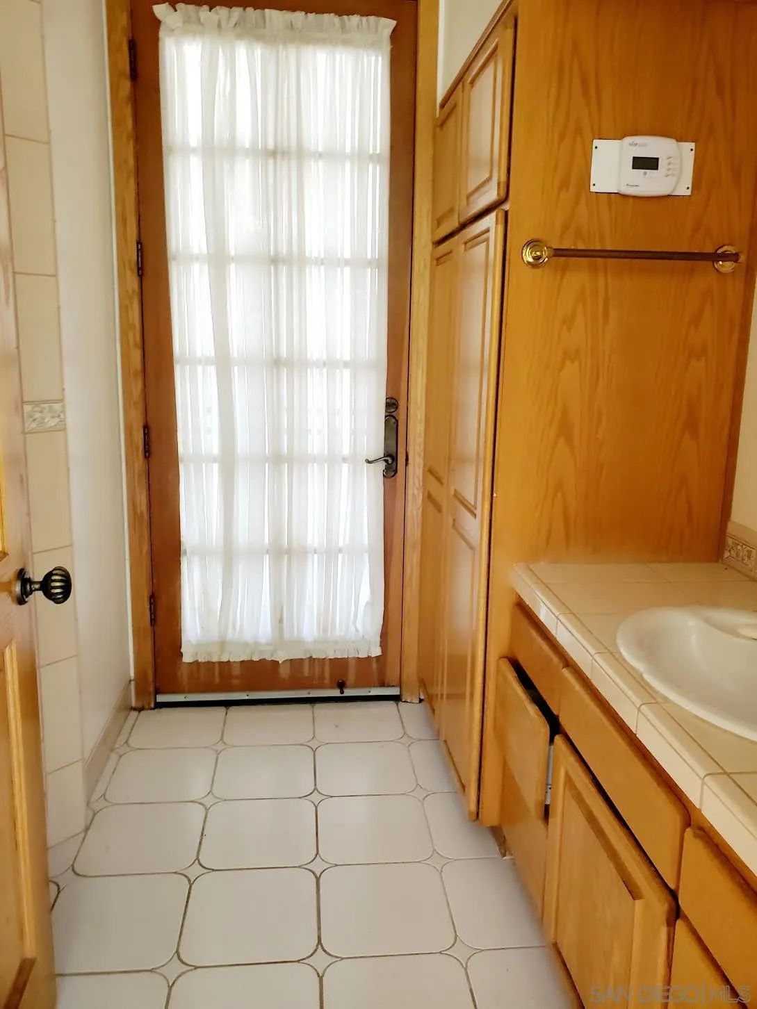 14316 Twisted Branch Road Poway, CA 92064 - Photo 25 of 36 a bathroom with a shower and a tub