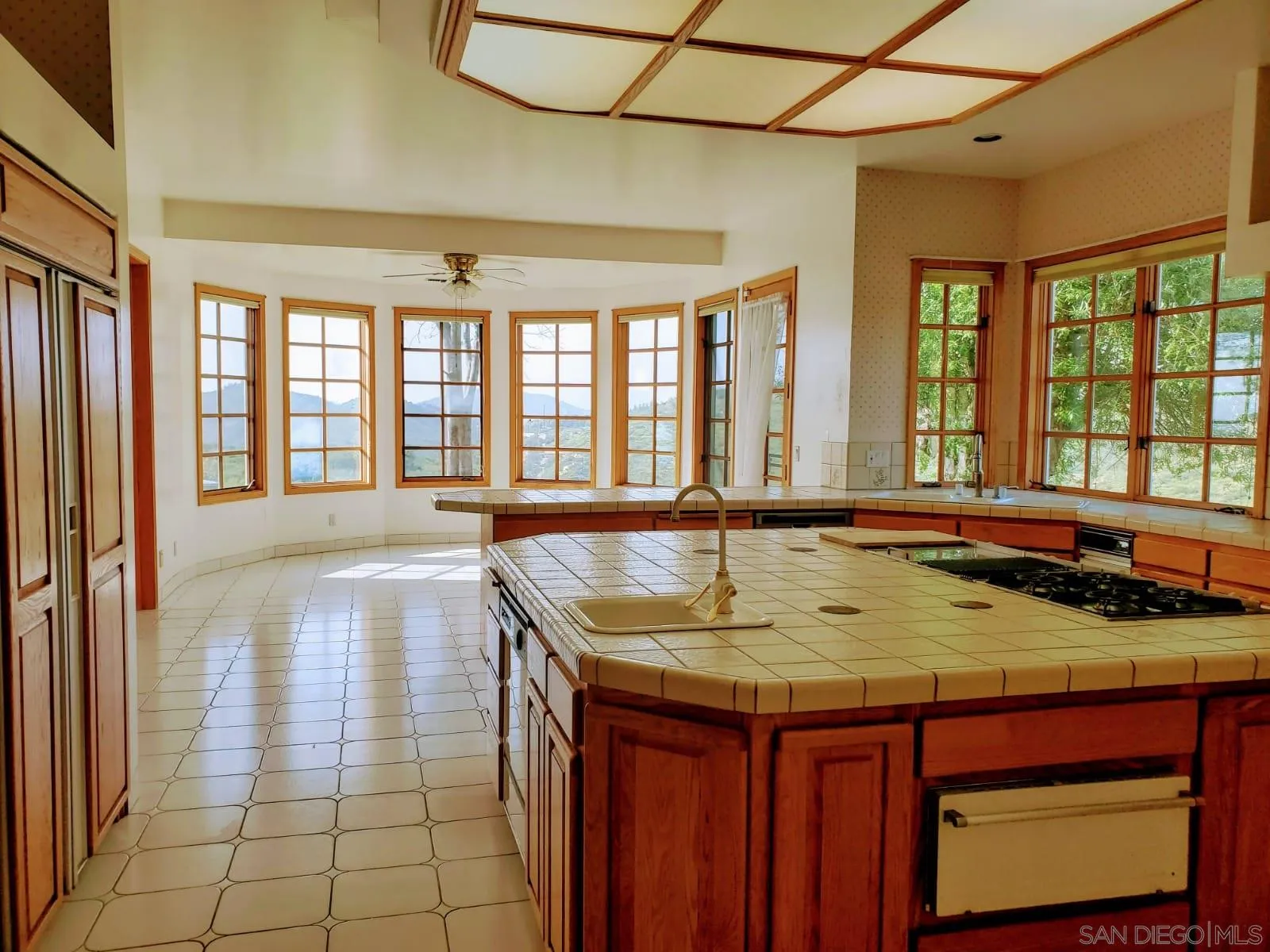 14316 Twisted Branch Road Poway, CA 92064 - Photo 27 of 36 a view of a living room and kitchen