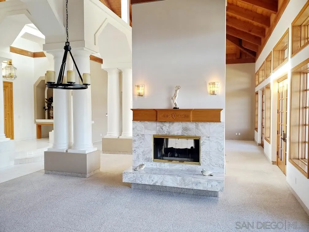 14316 Twisted Branch Road Poway, CA 92064 - Photo 10 of 36 a living room with furniture and a fireplace