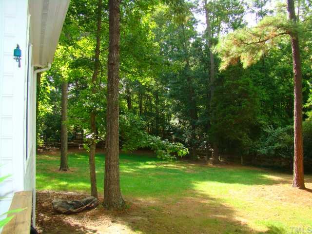 3409 Greenville Loop Road Wake Forest, NC 27587 - Photo 11 of 12 a view of a trees with a yard