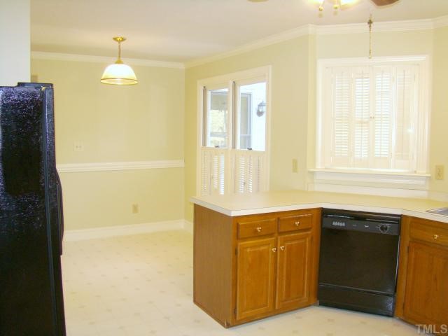 3409 Greenville Loop Road Wake Forest, NC 27587 - Photo 4 of 12 a bathroom with a sink a bathtub and a shower