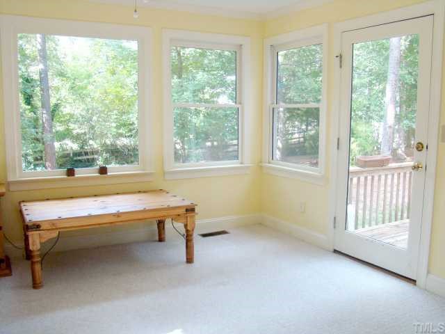 3409 Greenville Loop Road Wake Forest, NC 27587 - Photo 5 of 12 a room with pool table and windows