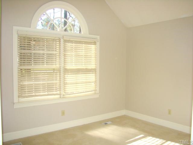 3409 Greenville Loop Road Wake Forest, NC 27587 - Photo 6 of 12 a view of empty room with window