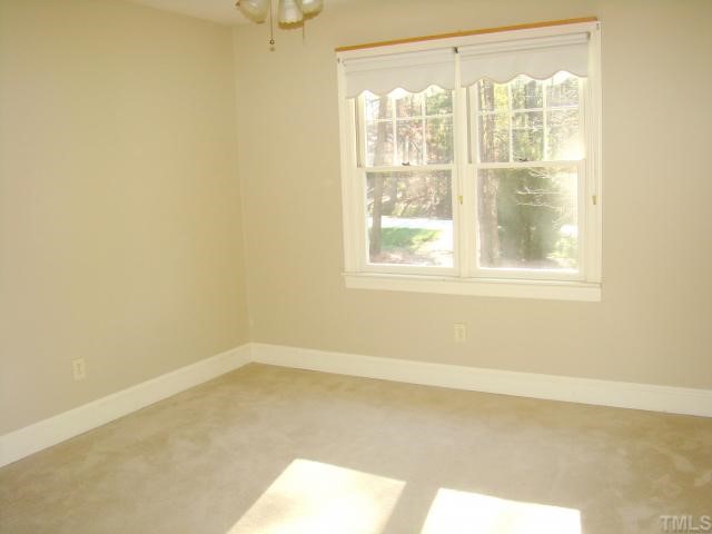 3409 Greenville Loop Road Wake Forest, NC 27587 - Photo 9 of 12 a view of a room that has a window in it