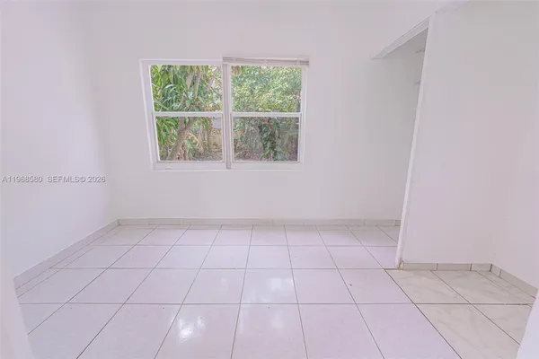 an empty room with a window