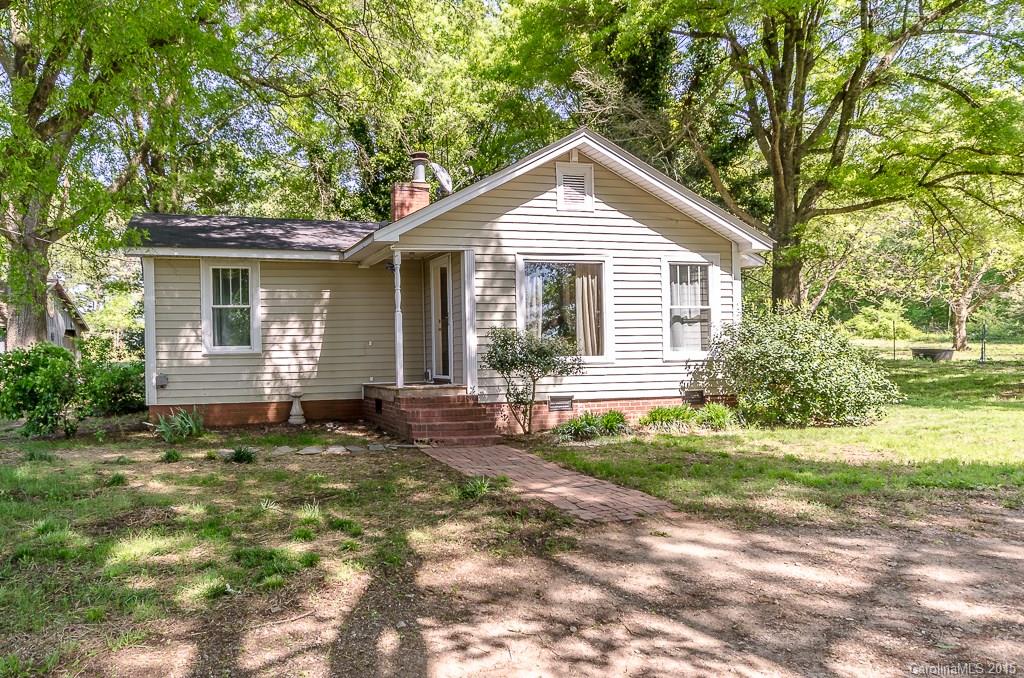 4401 Austin Road Monroe, NC 28112 - Photo 1 of 22 a front view of a house with a yard