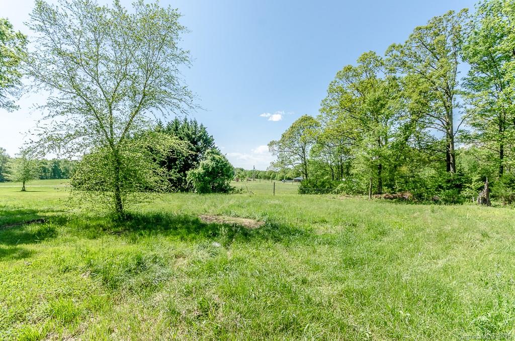 4401 Austin Road Monroe, NC 28112 - Photo 20 of 22 a view of an outdoor space and a yard