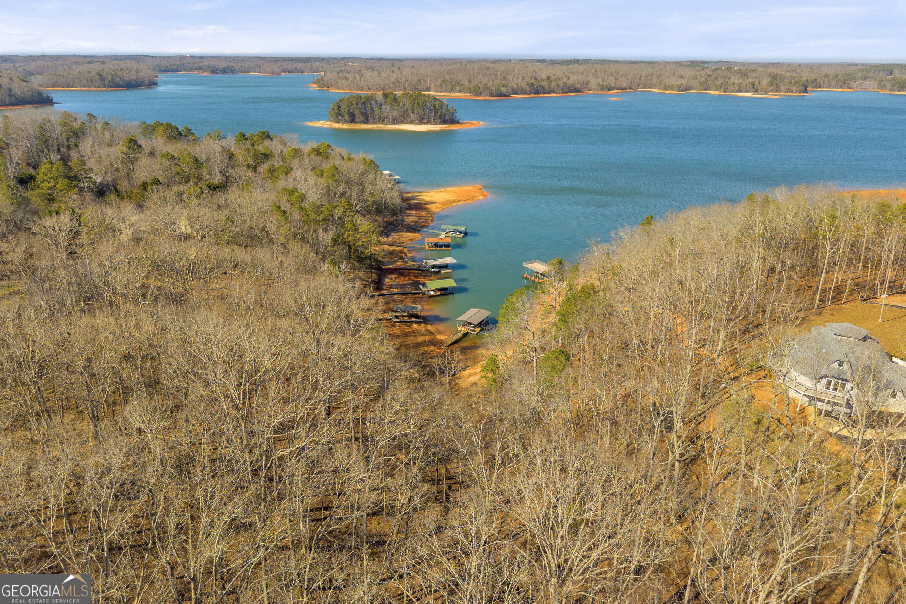 a view of lake with green space